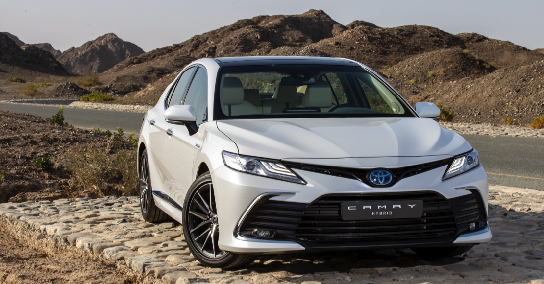 electric vehicle vs hybrid costs price performance