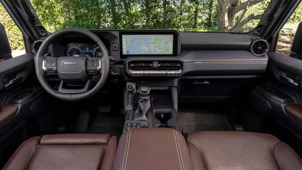 New Mitsubishi Pajero vs Toyota Prado specs features design space engine transmission compared